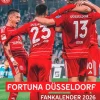 Neumann Verlage GmbH & Co Wandkalender*N Neumann - Fortuna Düsseldorf 2026 - Wandkalender A3 (30x42 cm) mit 12 Monatsblättern, deutschem Kalendarium & Spiralbindung, Fußball-Fankalender mit Spielerfotografien in Rot-Weiß
